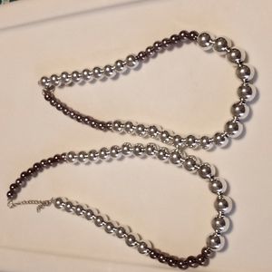 Silver and black tone chokers @ $10 each